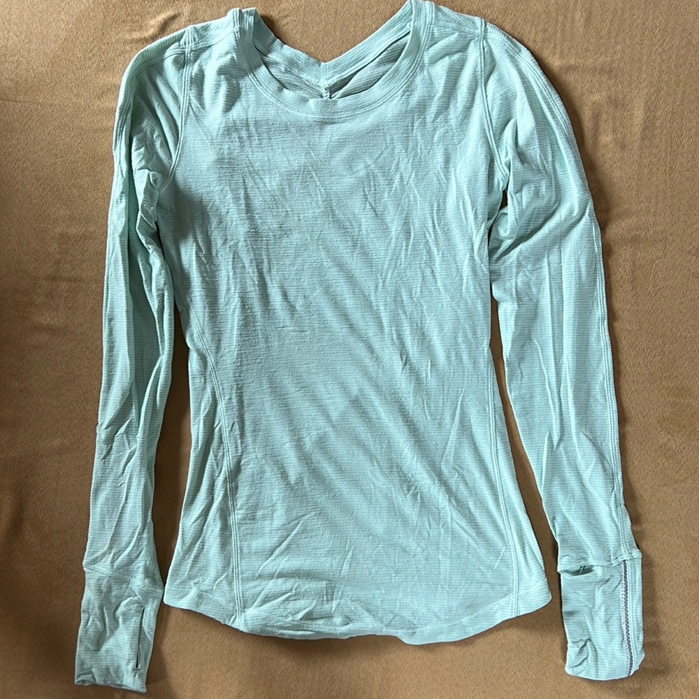 Mint colored lululemon long sleeve shirt size 4